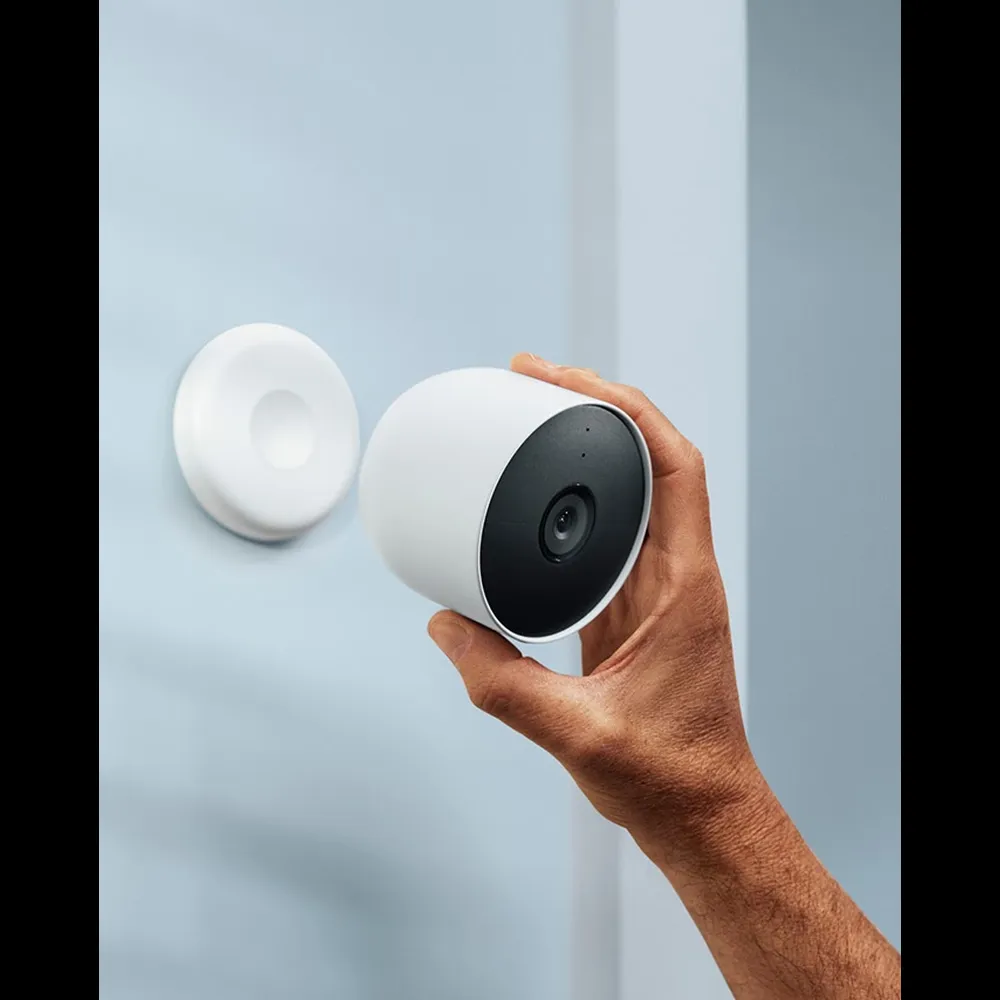 Google Nest Cam (Battery) being placed on wall