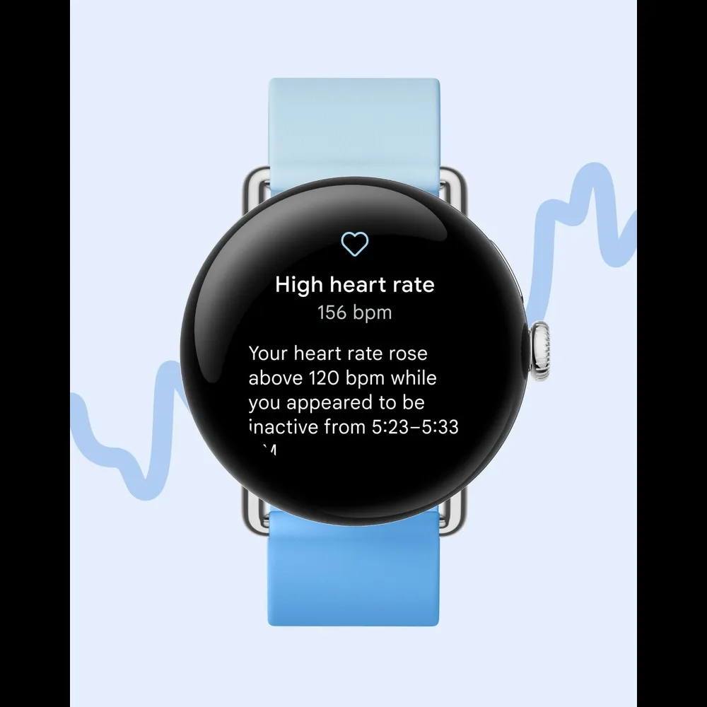 Google Pixel Watch 2 with a blue strap showing the face of the watch giving a high heart rate notification